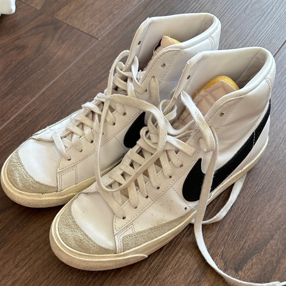 Nike White and Black High-Tops with Gold Accents